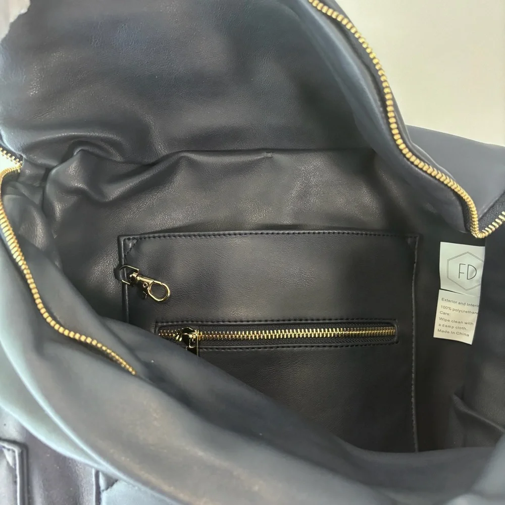 Fawn DesignThe Original Diaper Baby Travel Bag in Navy Faux Leather - Picture 2 of 6